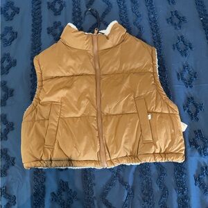 Reversible puffer/sherpa vest